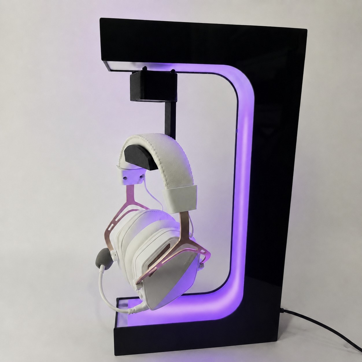 Real product photo of Beacon 01 with the universal cradle installed